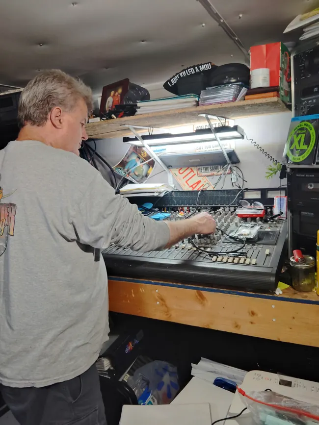 The Marksman working at the mixing console